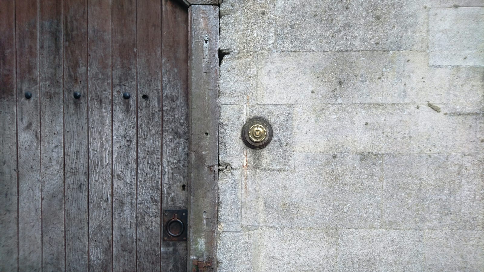 Old doorbell on wall